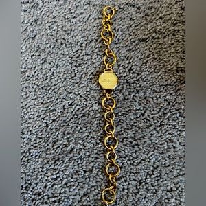 Coach gold chain link watch.